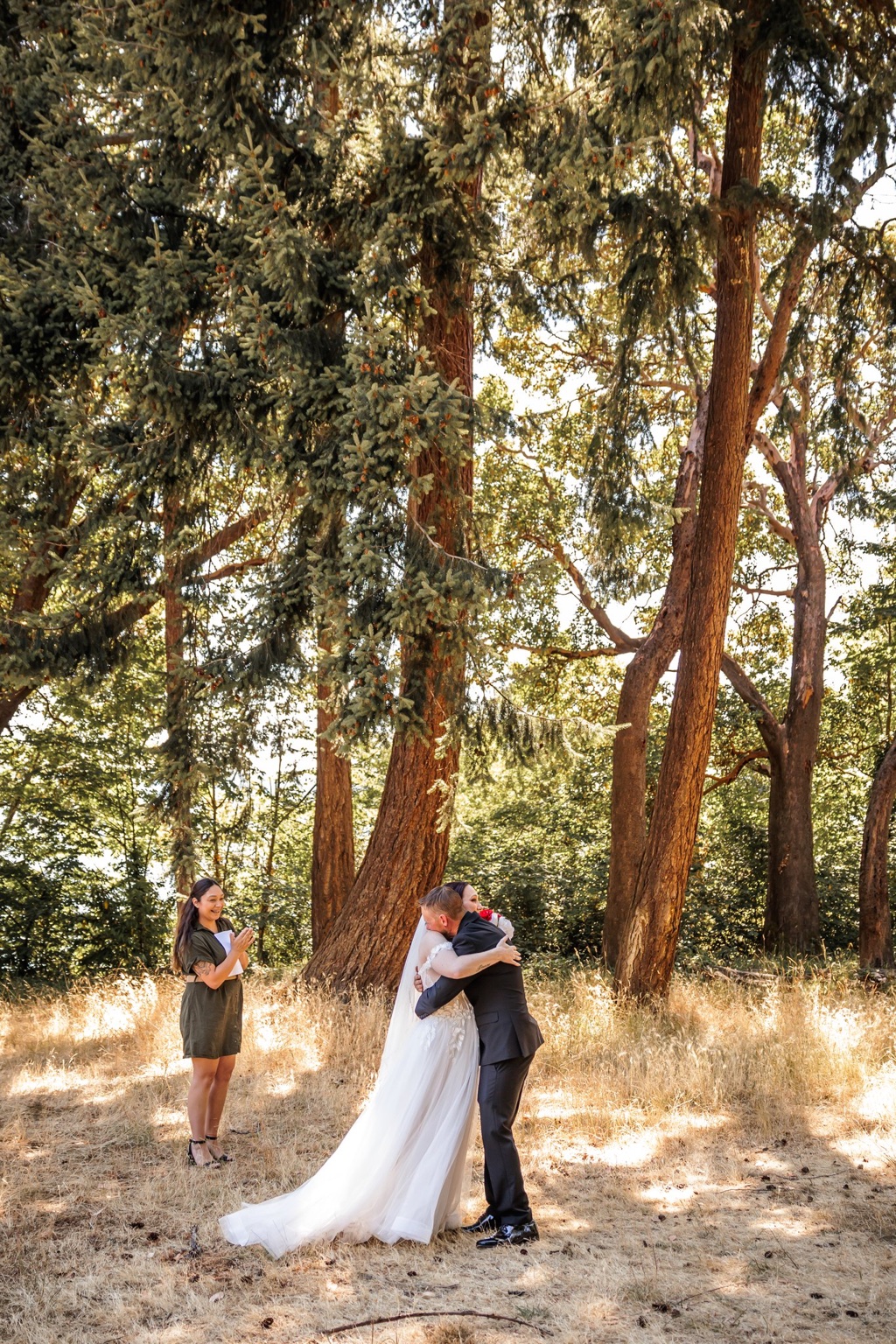 Couple hugging in a forest