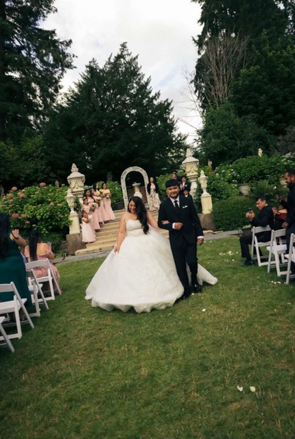 Newly married couple at a garden wedding